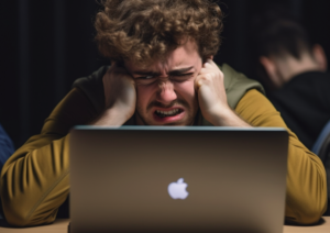 Student gefrustreerd achter MacBook