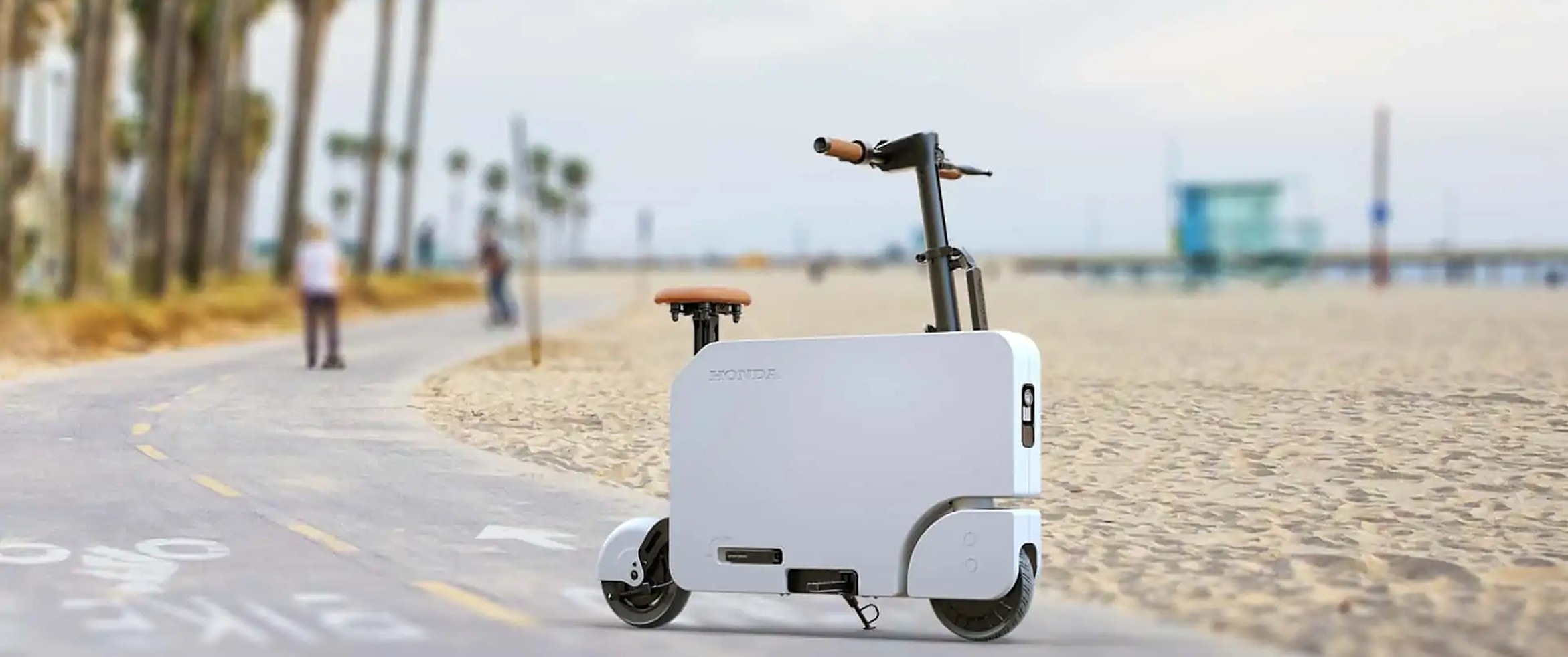 Elektrische scooter en koffer van Honda